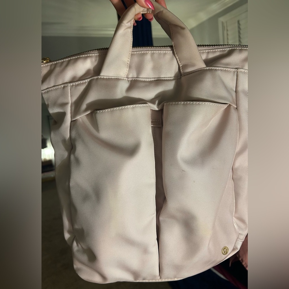 Light pink Lululemon backpack